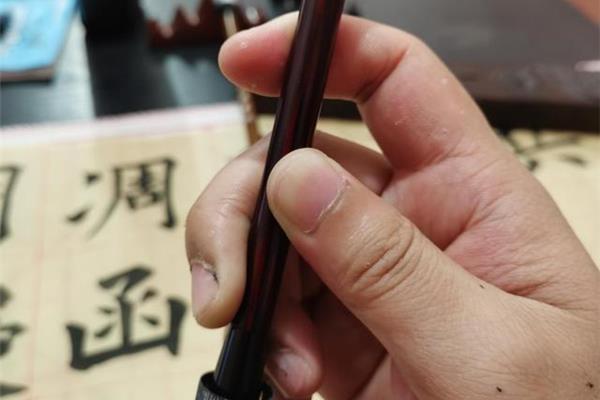拿毛筆的手法